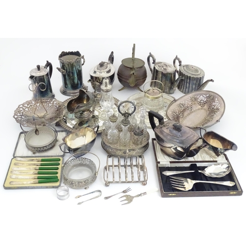 607 - A large quantity of assorted silver plated wares to include part tea set, toast rack, cased servers,... 