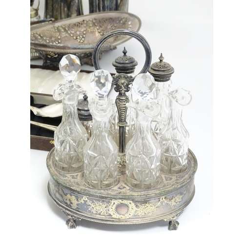 607 - A large quantity of assorted silver plated wares to include part tea set, toast rack, cased servers,... 