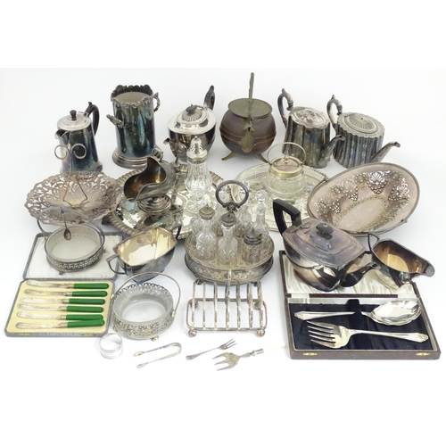 607 - A large quantity of assorted silver plated wares to include part tea set, toast rack, cased servers,... 