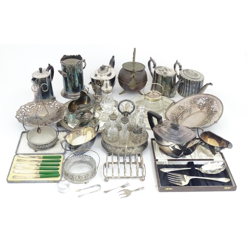 607 - A large quantity of assorted silver plated wares to include part tea set, toast rack, cased servers,... 