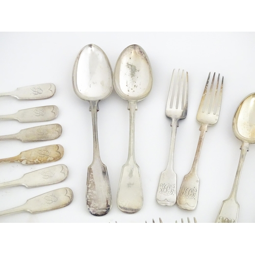 608 - A quantity of assorted silver plate flatware / cutlery include a berry spoon, salad servers etc