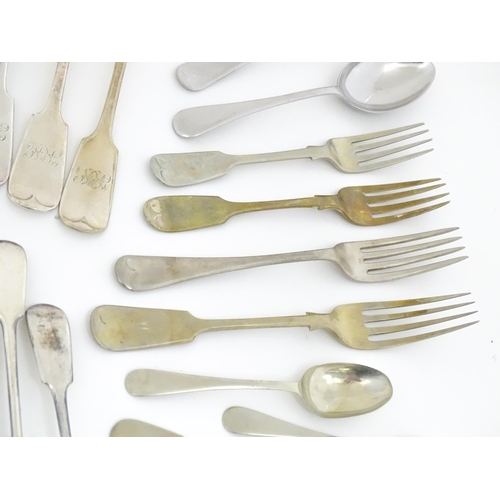 608 - A quantity of assorted silver plate flatware / cutlery include a berry spoon, salad servers etc