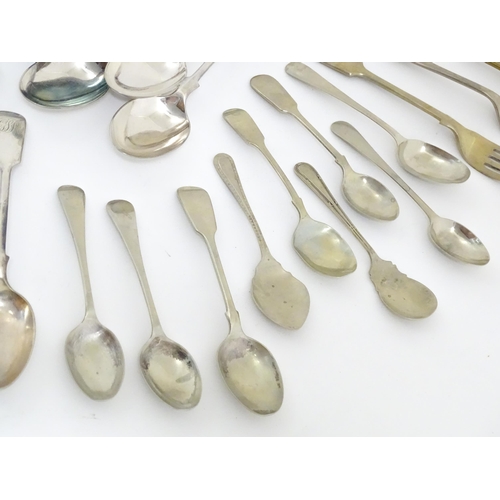 608 - A quantity of assorted silver plate flatware / cutlery include a berry spoon, salad servers etc