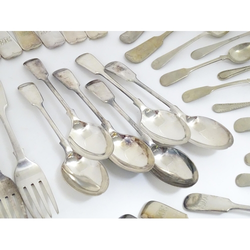 608 - A quantity of assorted silver plate flatware / cutlery include a berry spoon, salad servers etc