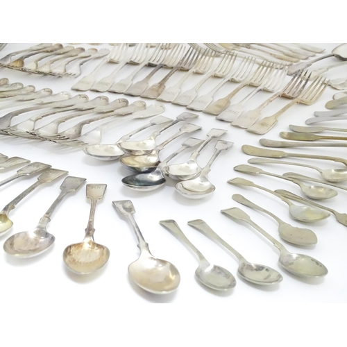 608 - A quantity of assorted silver plate flatware / cutlery include a berry spoon, salad servers etc