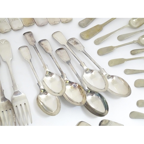 608 - A quantity of assorted silver plate flatware / cutlery include a berry spoon, salad servers etc