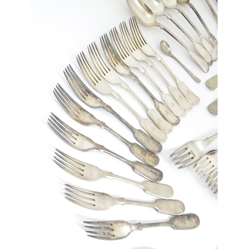 608 - A quantity of assorted silver plate flatware / cutlery include a berry spoon, salad servers etc