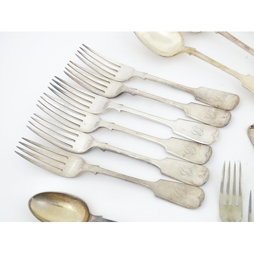 608 - A quantity of assorted silver plate flatware / cutlery include a berry spoon, salad servers etc