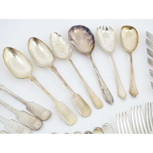 608 - A quantity of assorted silver plate flatware / cutlery include a berry spoon, salad servers etc