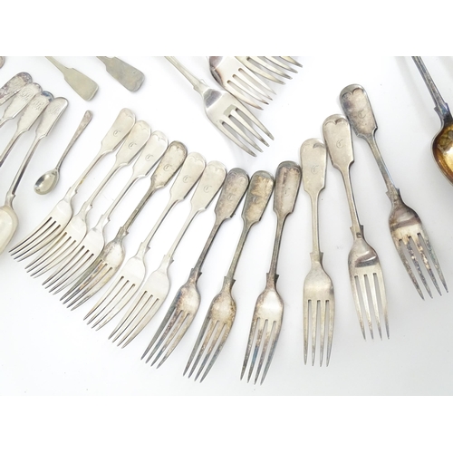 608 - A quantity of assorted silver plate flatware / cutlery include a berry spoon, salad servers etc