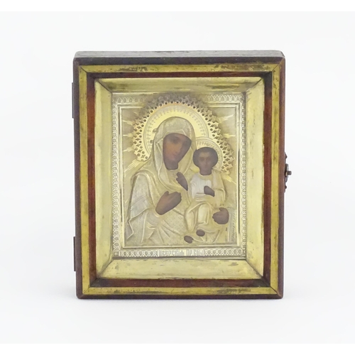 1053 - A late 19th / early 20thC Russian icon depicting Madonna and Child, the Virgin Mary and Jesus Christ... 