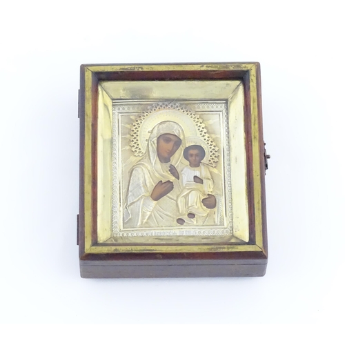 1053 - A late 19th / early 20thC Russian icon depicting Madonna and Child, the Virgin Mary and Jesus Christ... 