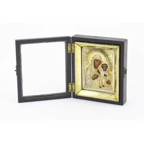 1053 - A late 19th / early 20thC Russian icon depicting Madonna and Child, the Virgin Mary and Jesus Christ... 