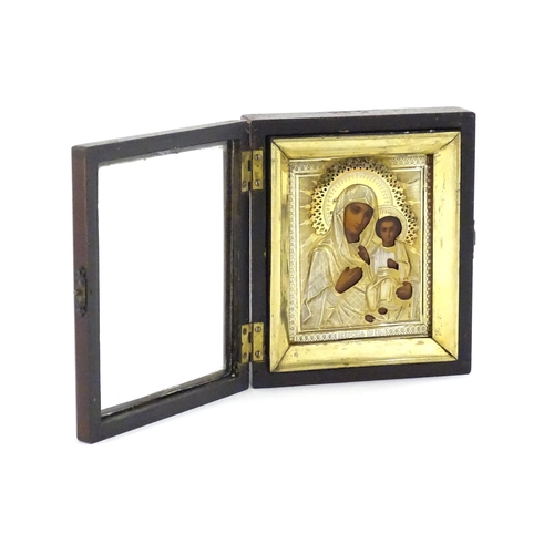 1053 - A late 19th / early 20thC Russian icon depicting Madonna and Child, the Virgin Mary and Jesus Christ... 