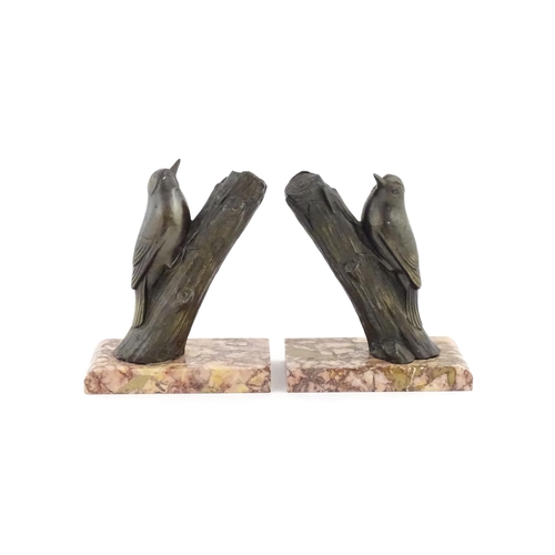 1104 - A pair of 20thC bookends with cast nuthatch bird on branch detail after Michel Leducq (1879-1955). F... 