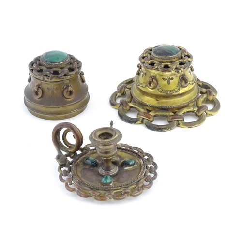 1107 - Two Victorian brass inkwells of capstan form, with chain link detail and applied malachite cabochon ... 