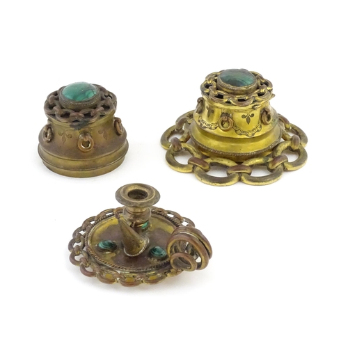 1107 - Two Victorian brass inkwells of capstan form, with chain link detail and applied malachite cabochon ... 