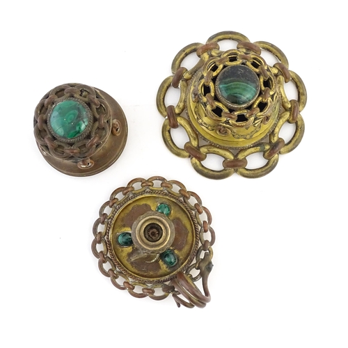 1107 - Two Victorian brass inkwells of capstan form, with chain link detail and applied malachite cabochon ... 