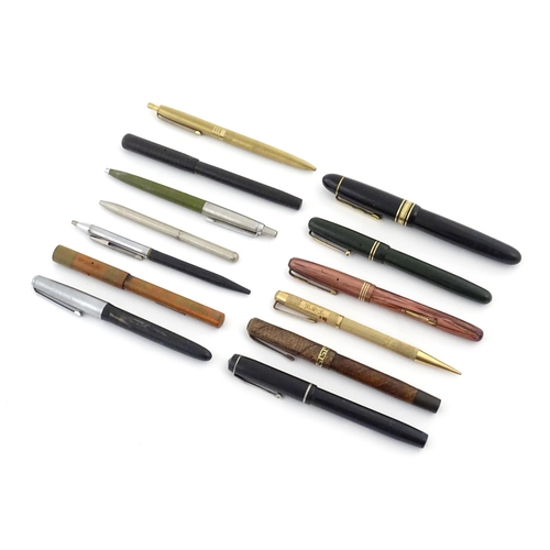 1113 - A quantity of mid to late 20thC pens, comprising: a Senator fountain pen with 14K 385 nib, a Mabie T... 