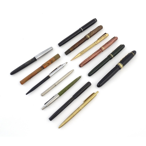 1113 - A quantity of mid to late 20thC pens, comprising: a Senator fountain pen with 14K 385 nib, a Mabie T... 