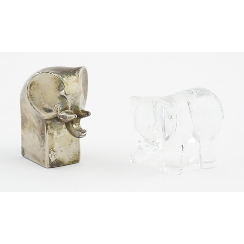 1116 - A 20thC silver plated model of a stylised elephant by Dansk Designs of Japan. Together with a glass ... 