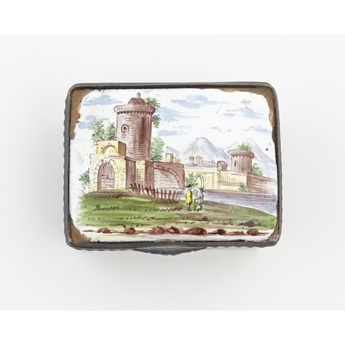 1129 - A late 19th / early 20thC enamel snuff box of rectangular form decorated with a landscape scene with... 