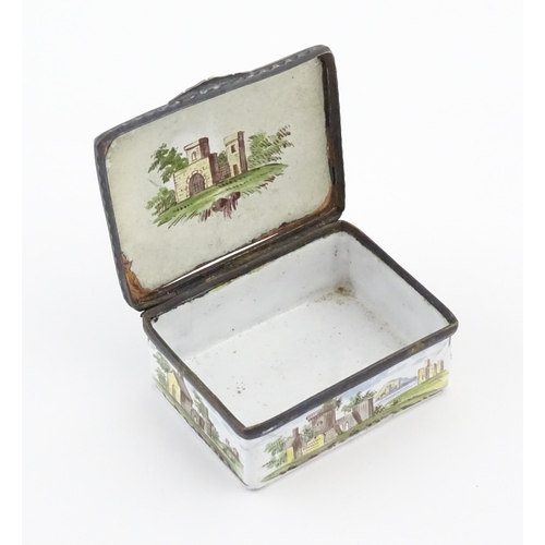 1129 - A late 19th / early 20thC enamel snuff box of rectangular form decorated with a landscape scene with... 