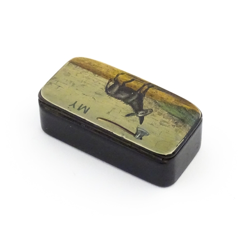 1133 - An early 19thC papier mache novelty snuff box with hand painted pictorial motto to lid, depicting an... 