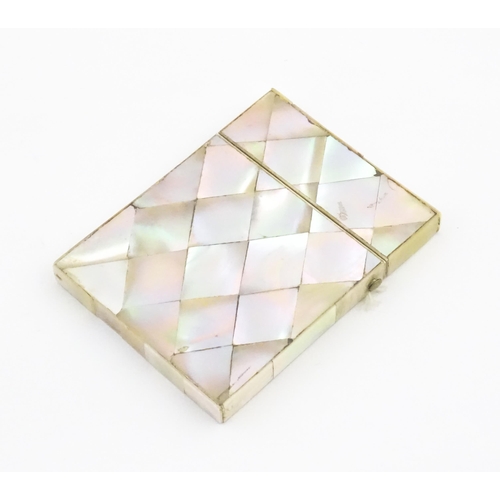 1134 - A Victorian mother of pearl card case of rectangular form. Approx. 4