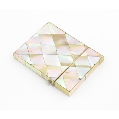 1134 - A Victorian mother of pearl card case of rectangular form. Approx. 4