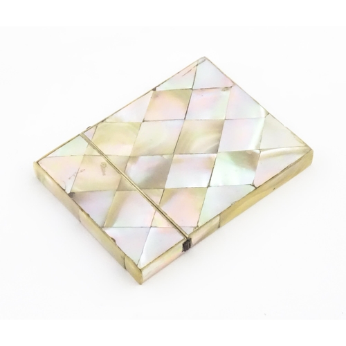 1134 - A Victorian mother of pearl card case of rectangular form. Approx. 4