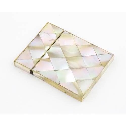 1134 - A Victorian mother of pearl card case of rectangular form. Approx. 4