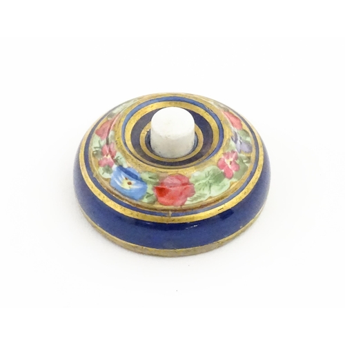 1137 - An early 20thC porcelain door bell / push bell with  banded floral and foliate decoration. Approx. 2... 