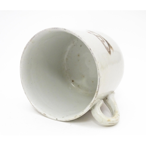 809 - Militaria: an early 20thC ceramic mug with First World War / WWI / World War 1 commemorative decorat... 