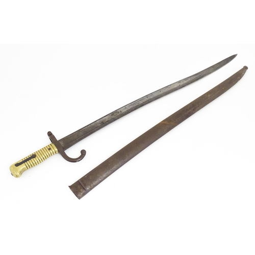 810 - Militaria : a 19thC French M1866 Chassepot Yataghan sword bayonet , bearing Alex Coppel Solingen sca... 