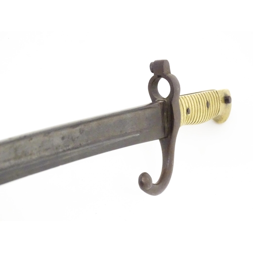 810 - Militaria : a 19thC French M1866 Chassepot Yataghan sword bayonet , bearing Alex Coppel Solingen sca... 