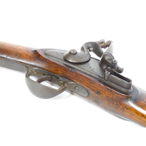 793 - A 19thC Belgian flintlock fowling piece, the smoothbore twist barrel (approx 28 gauge) measuring 35 ... 