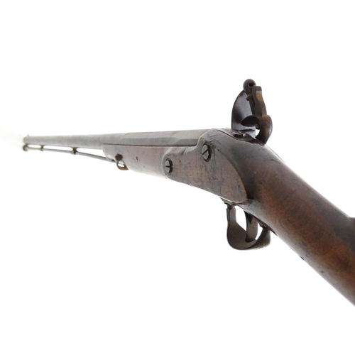 793 - A 19thC Belgian flintlock fowling piece, the smoothbore twist barrel (approx 28 gauge) measuring 35 ... 