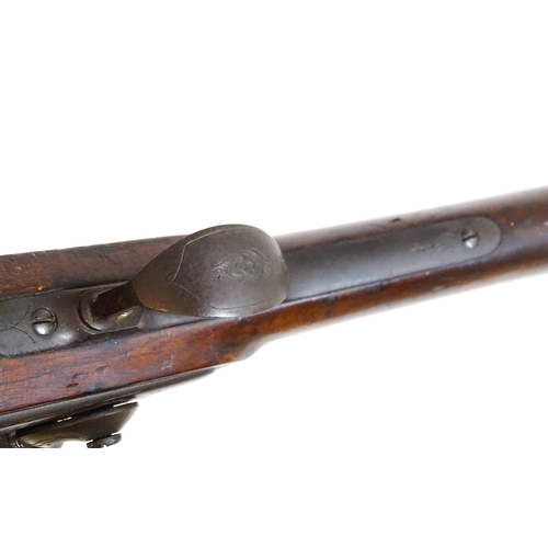 793 - A 19thC Belgian flintlock fowling piece, the smoothbore twist barrel (approx 28 gauge) measuring 35 ... 