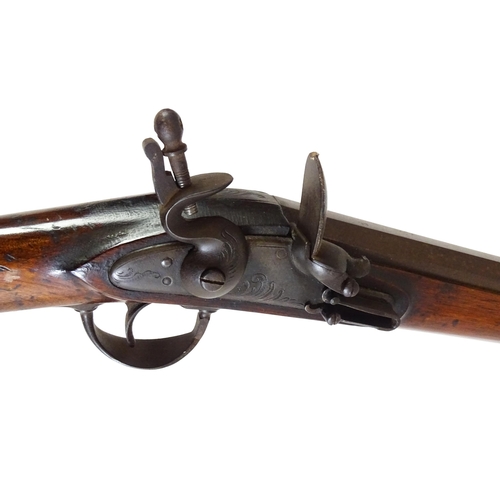 793 - A 19thC Belgian flintlock fowling piece, the smoothbore twist barrel (approx 28 gauge) measuring 35 ... 