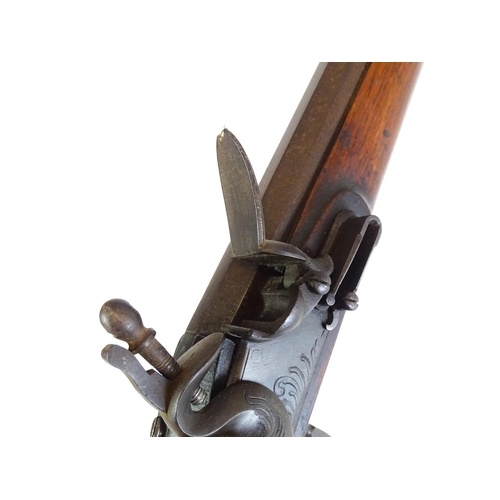 793 - A 19thC Belgian flintlock fowling piece, the smoothbore twist barrel (approx 28 gauge) measuring 35 ... 