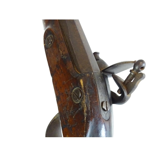 793 - A 19thC Belgian flintlock fowling piece, the smoothbore twist barrel (approx 28 gauge) measuring 35 ... 