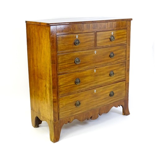 1325 - A Victorian mahogany chest of drawers of large proportions, the chest comprising, two small frieze d... 