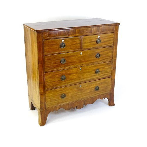 1325 - A Victorian mahogany chest of drawers of large proportions, the chest comprising, two small frieze d... 