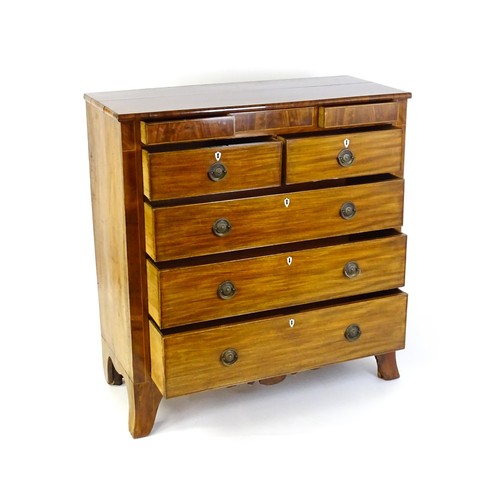 1325 - A Victorian mahogany chest of drawers of large proportions, the chest comprising, two small frieze d... 