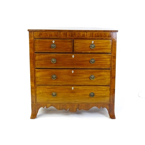 1325 - A Victorian mahogany chest of drawers of large proportions, the chest comprising, two small frieze d... 