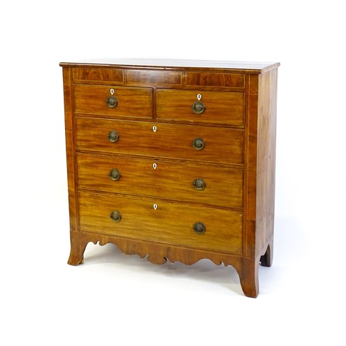 1325 - A Victorian mahogany chest of drawers of large proportions, the chest comprising, two small frieze d... 