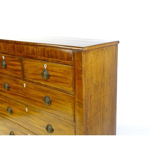 1325 - A Victorian mahogany chest of drawers of large proportions, the chest comprising, two small frieze d... 