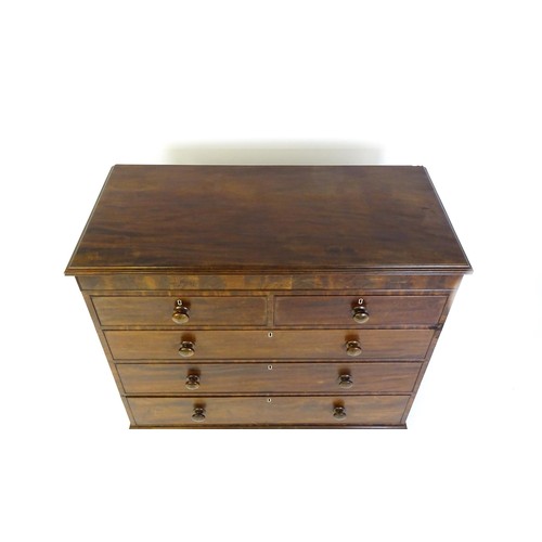 1326 - A late 18thC / early 19thC mahogany chest of drawers, comprising two short over three long graduated... 