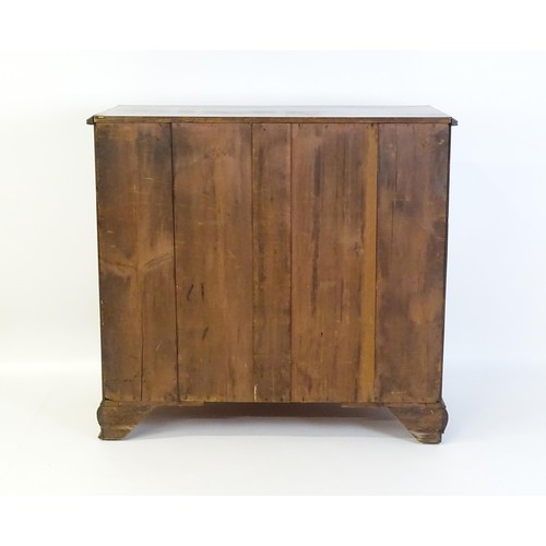 1326 - A late 18thC / early 19thC mahogany chest of drawers, comprising two short over three long graduated... 